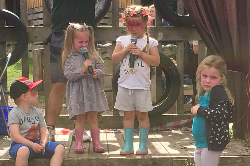 Children singing at Glastovenny